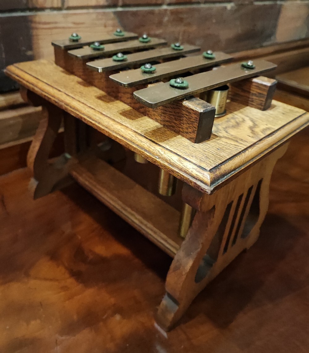 Antique oak and brass table top dinner chimes  View II