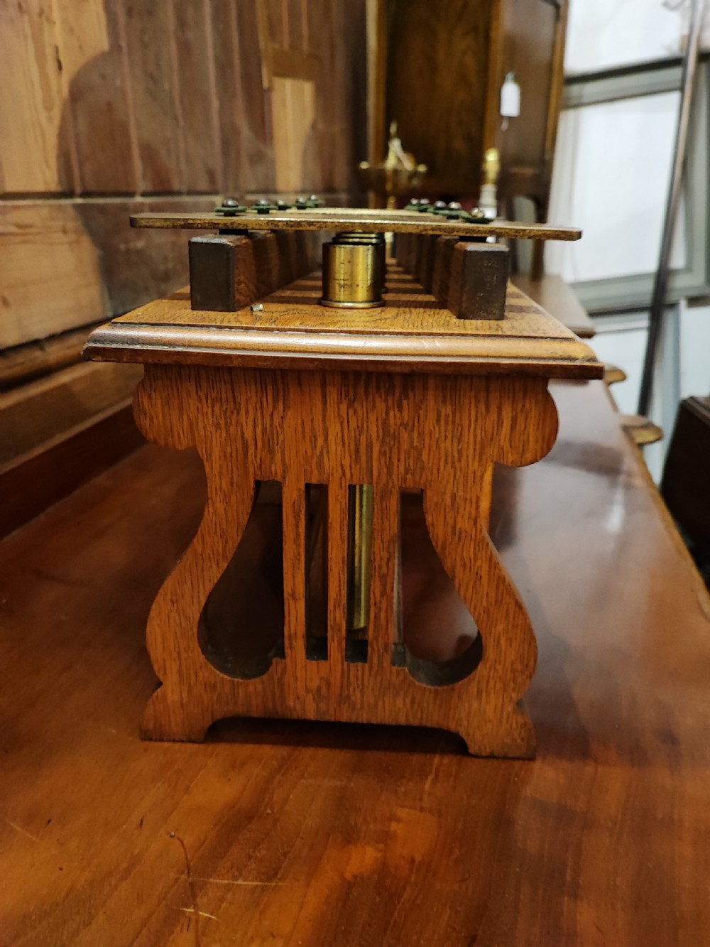 Antique oak and brass table top dinner chimes  View IV