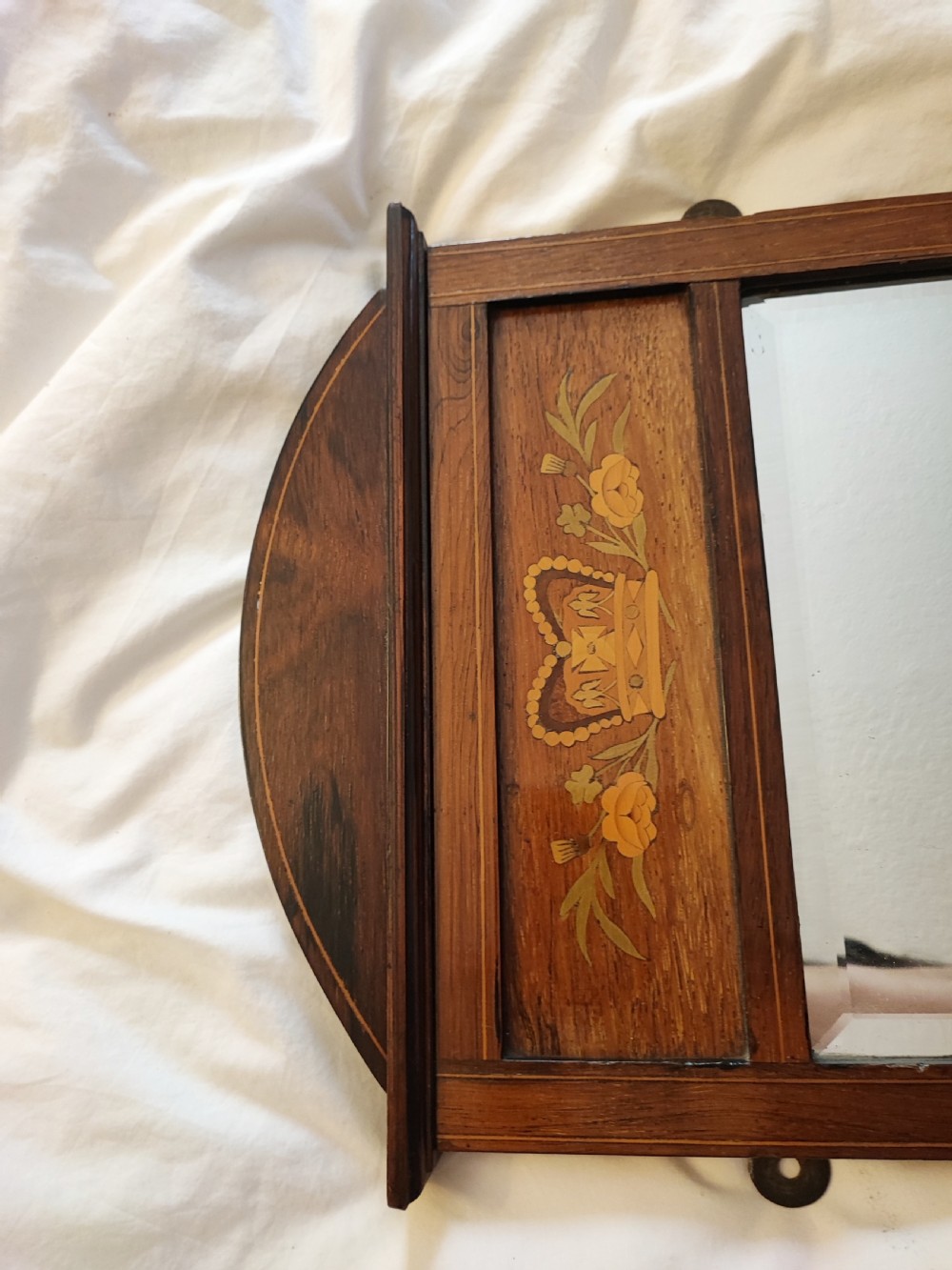 A Victorian marquetry rosewood hanging mirror. View III