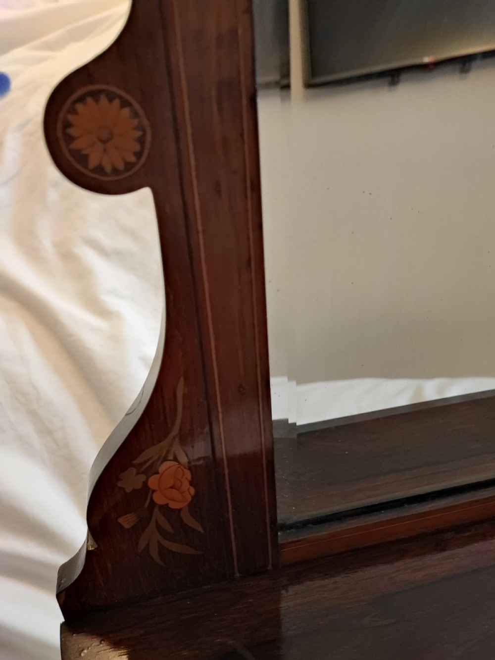 A Victorian marquetry rosewood hanging mirror. View VI