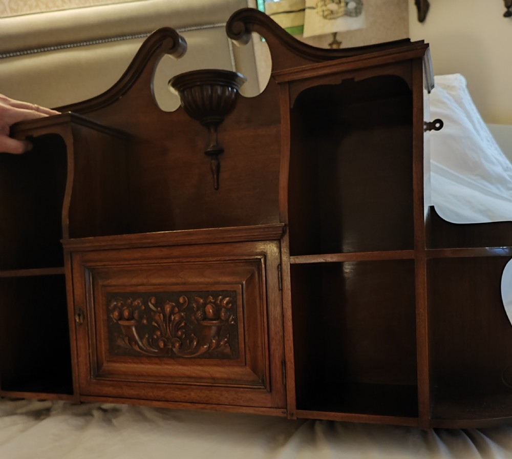 An antique mahogany hanging wall shelf with cabinet. View IV