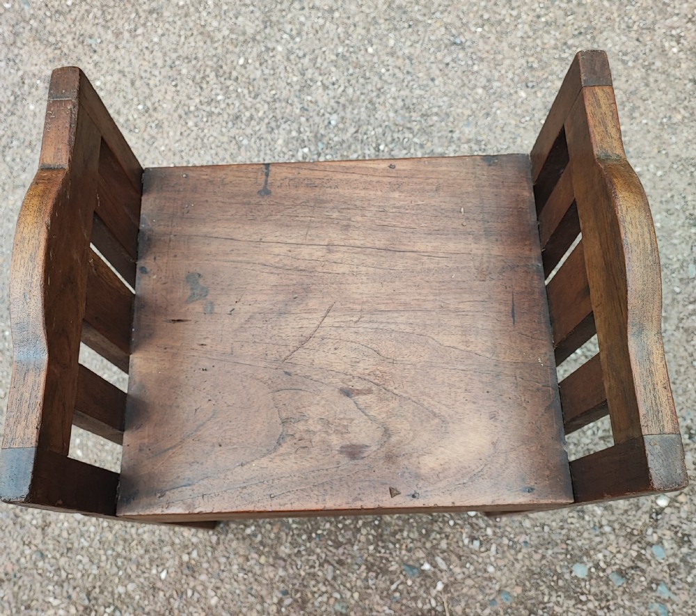 An Arts and Crafts walnut Scottish stool. View IV