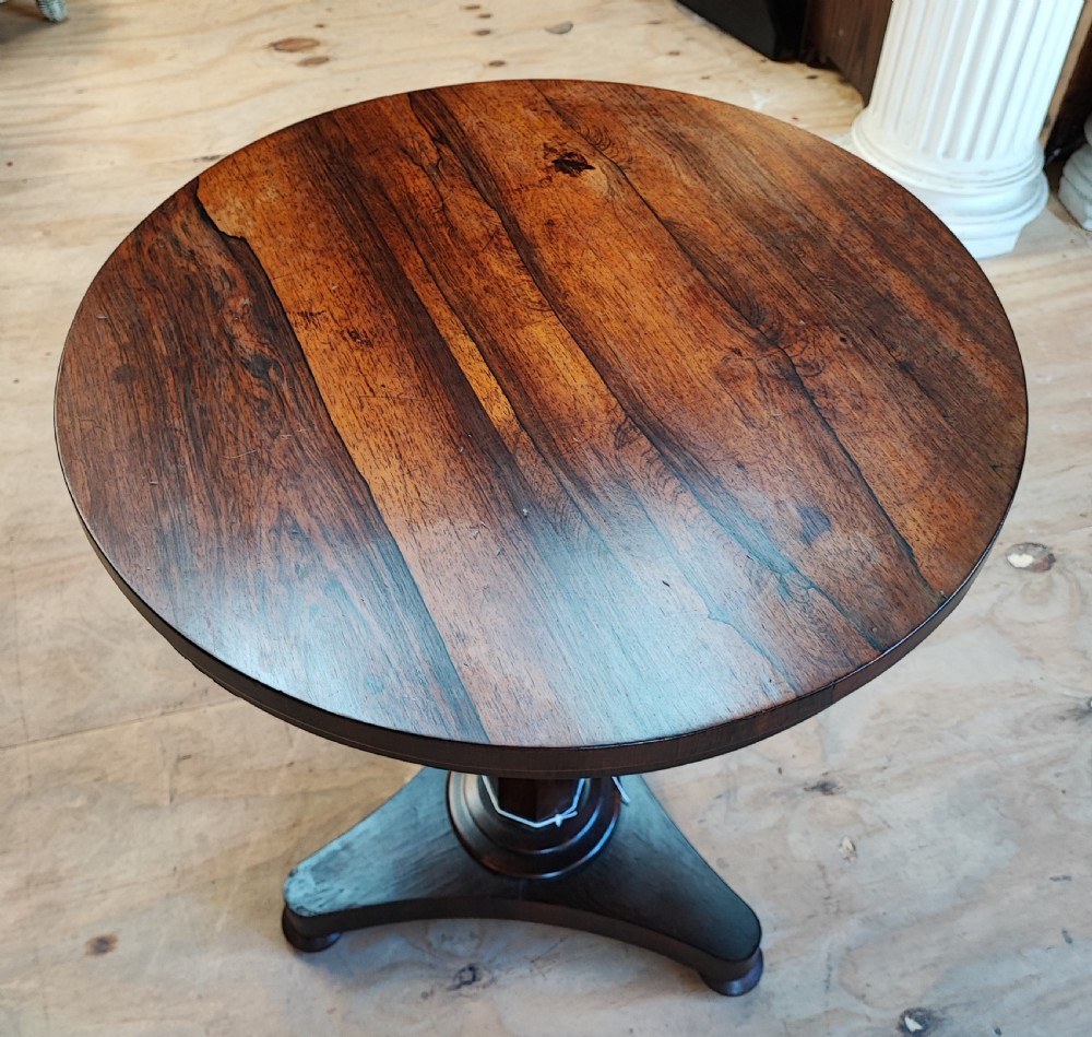 A Regency rosewood wine or lamp table. View VII