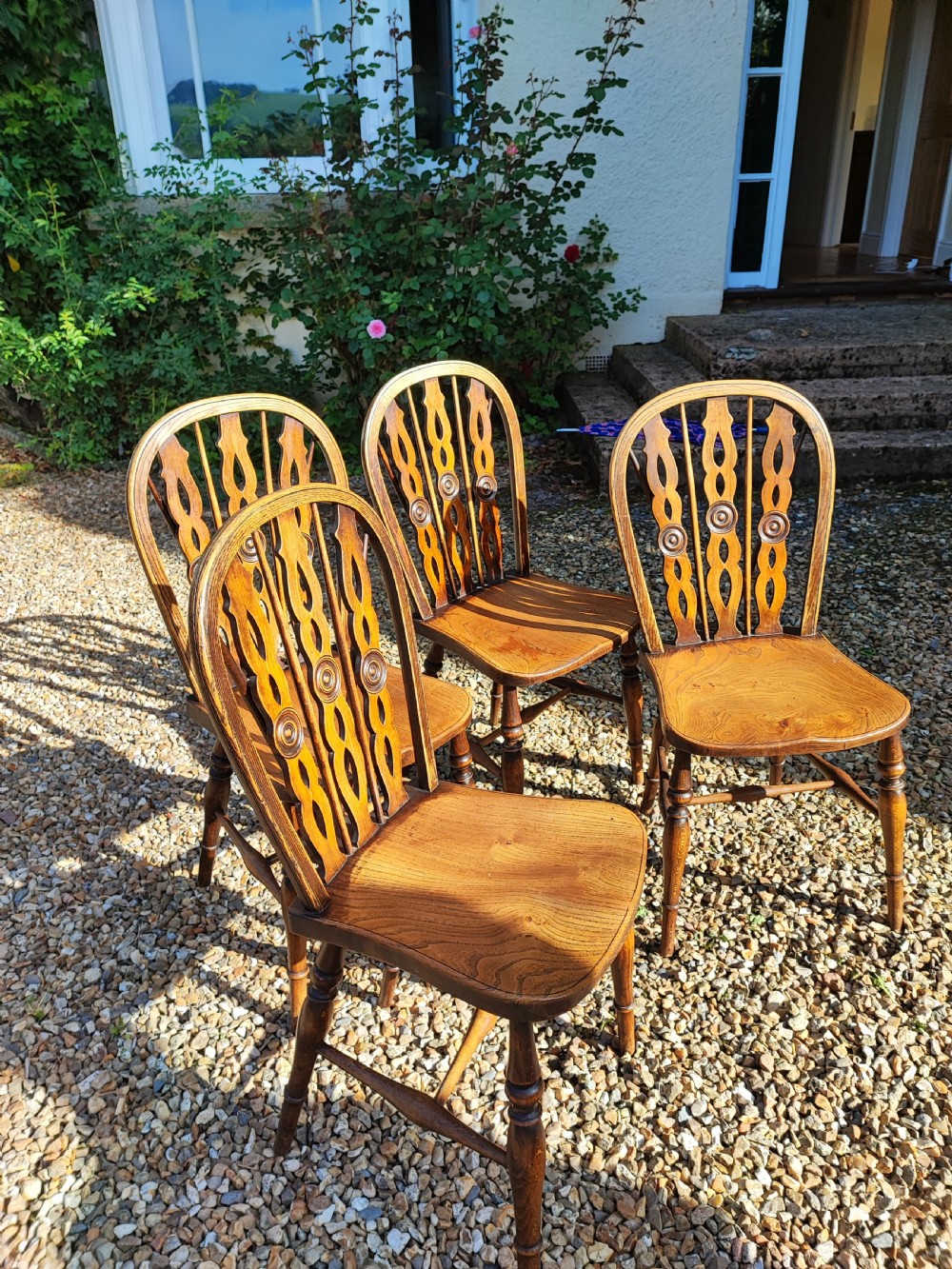 Antique Set of 4 Domino back Windsor chairs.