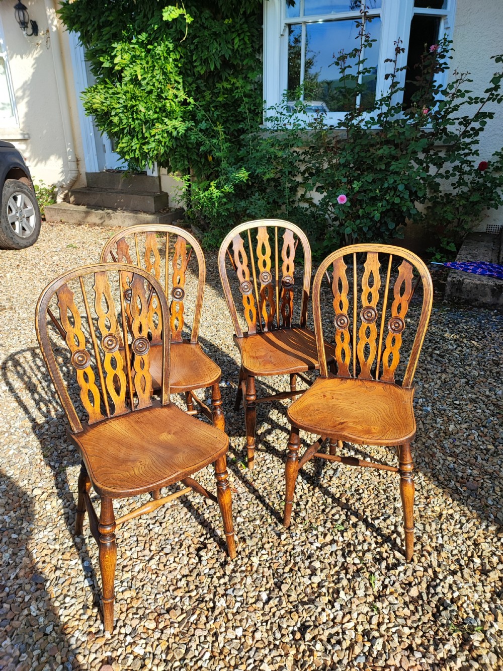 Antique Set of 4 Domino back Windsor chairs. View III