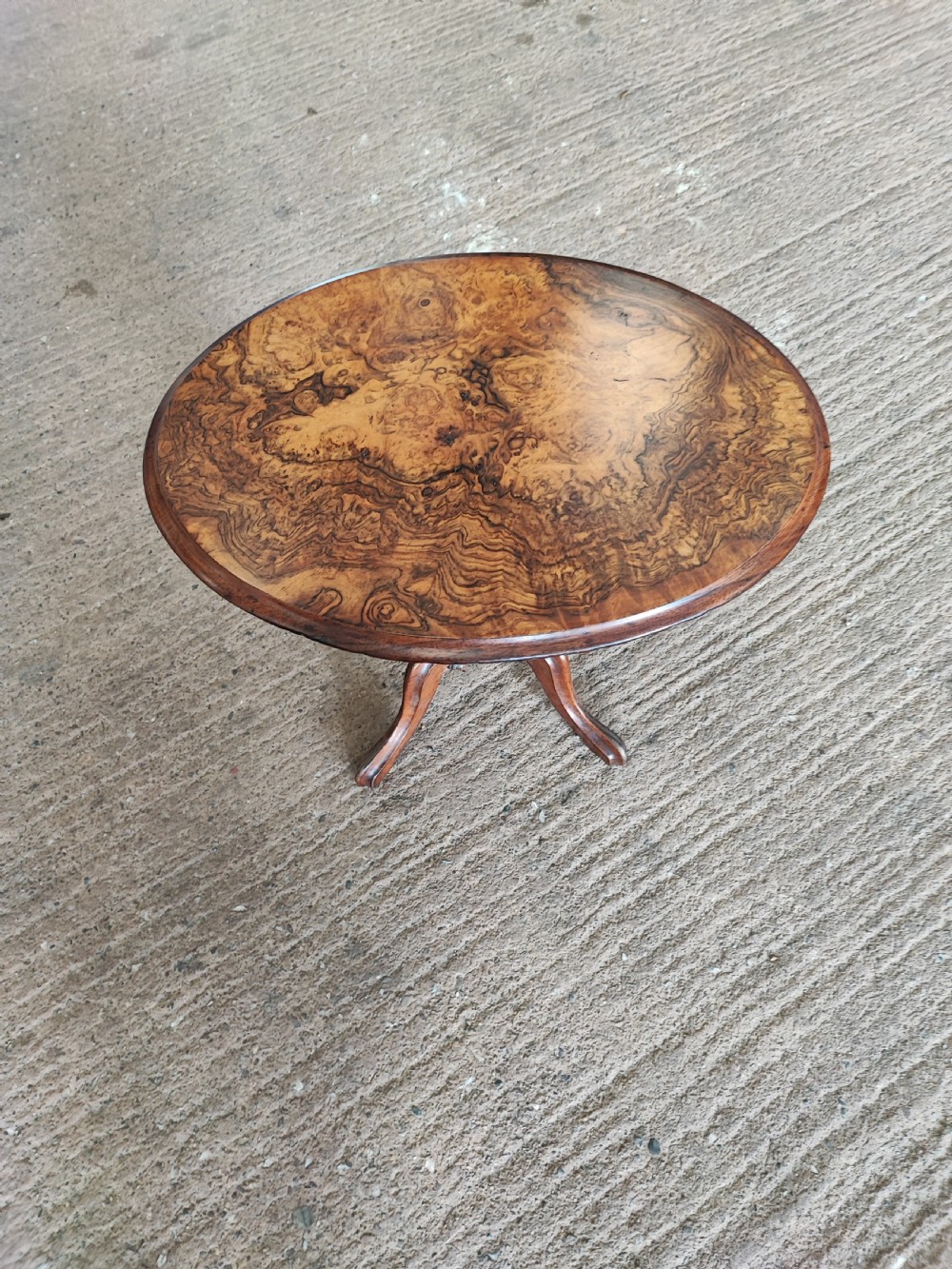 Victorian burr walnut low tripod table.