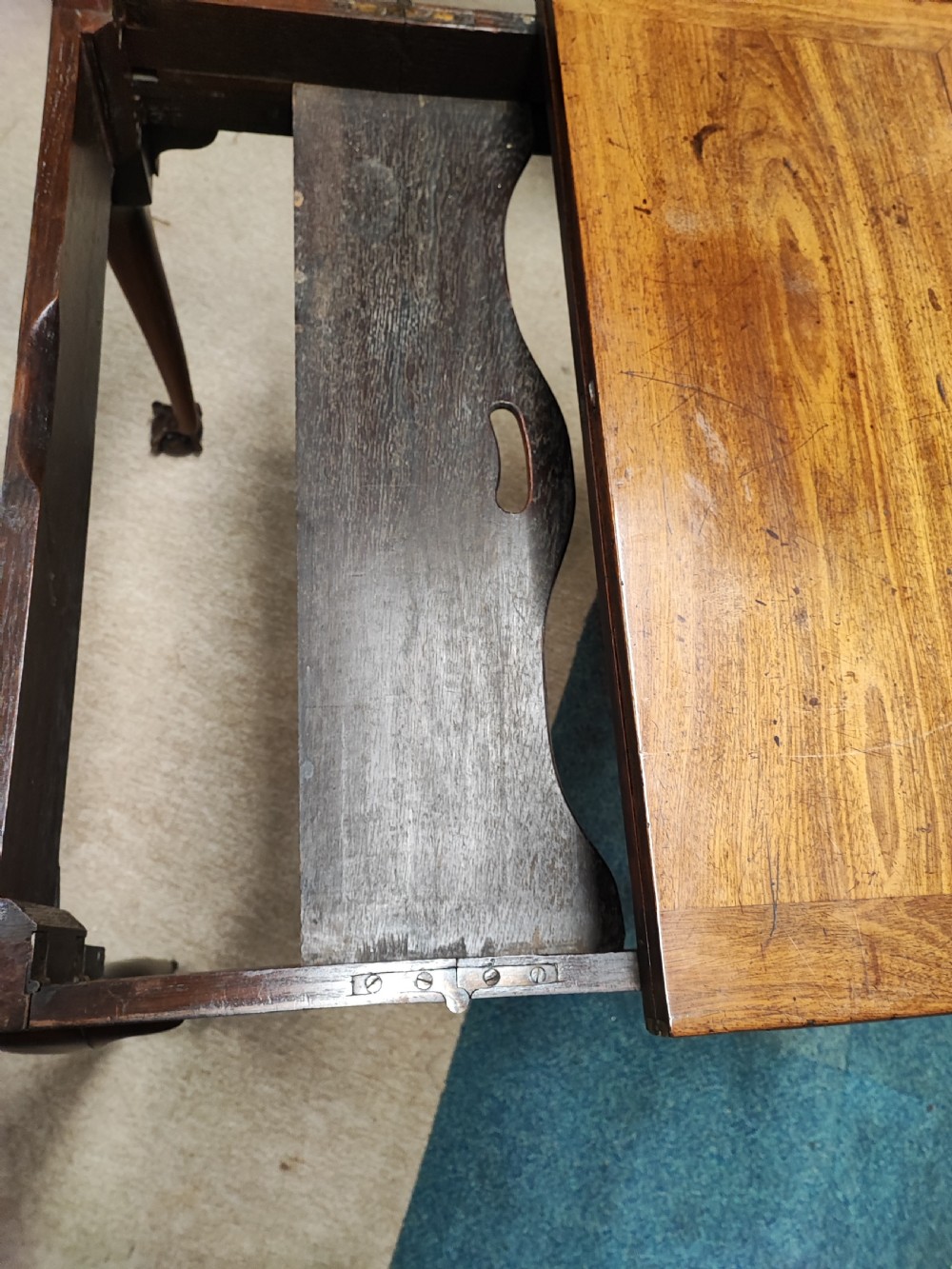 A fine George ll red walnut concertina tea table  View II