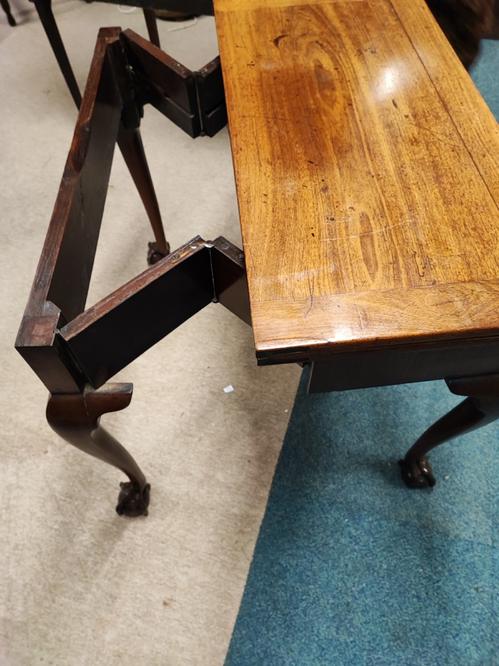 A fine George ll red walnut concertina tea table  View III