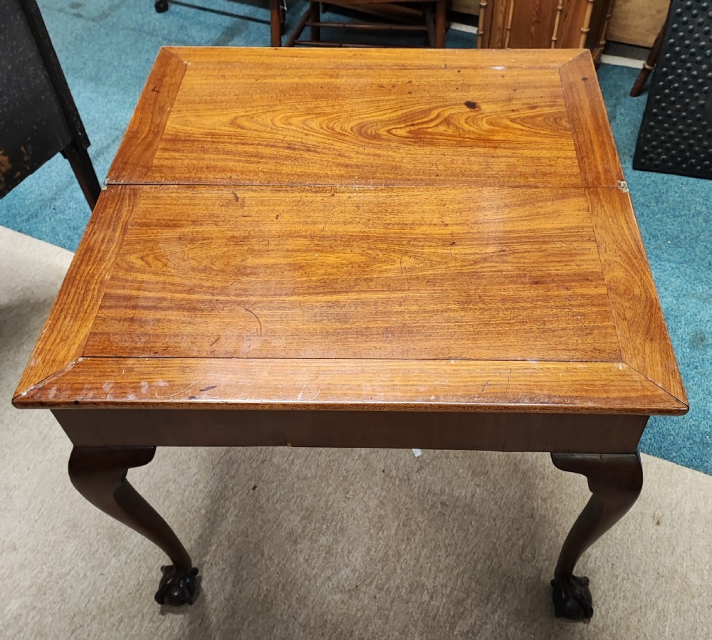 A fine George ll red walnut concertina tea table  View XIV