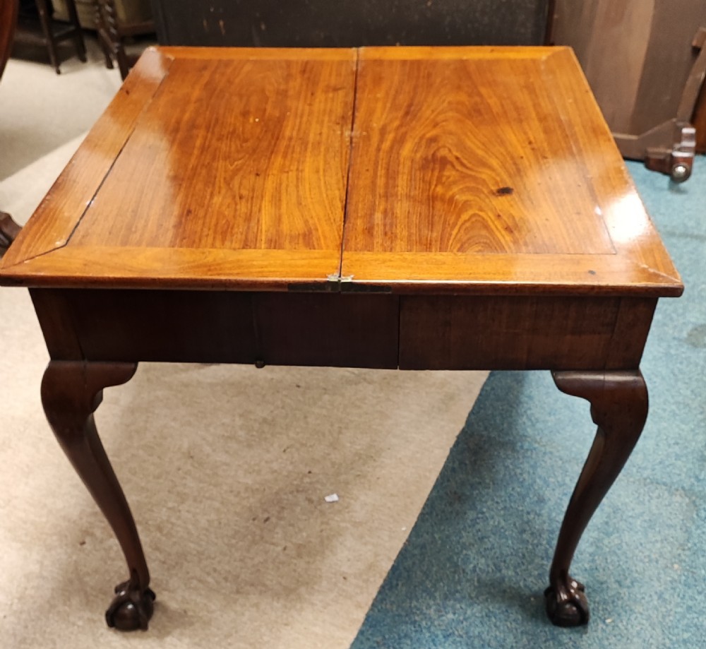 A fine George ll red walnut concertina tea table  View XV