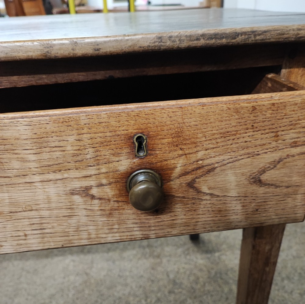 A small Georgian oak kitchen table. View II