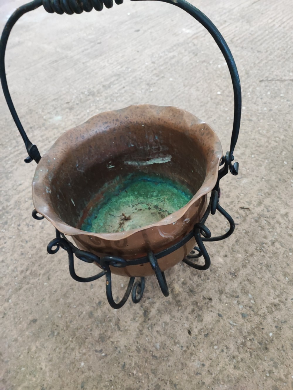 An Arts and Crafts copper and iron coal or log bucket. View IV