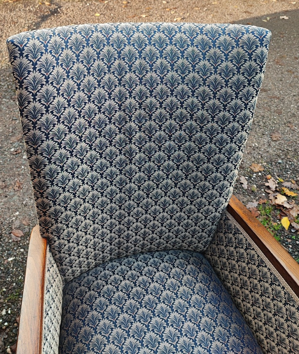 A pair of art deco upholstered armchairs. View II