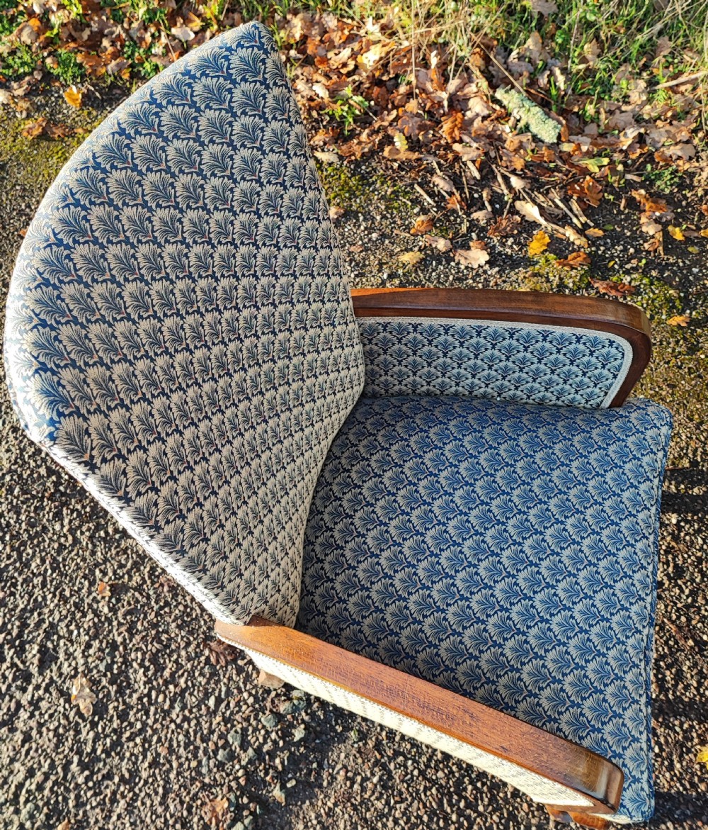 A pair of art deco upholstered armchairs. View III