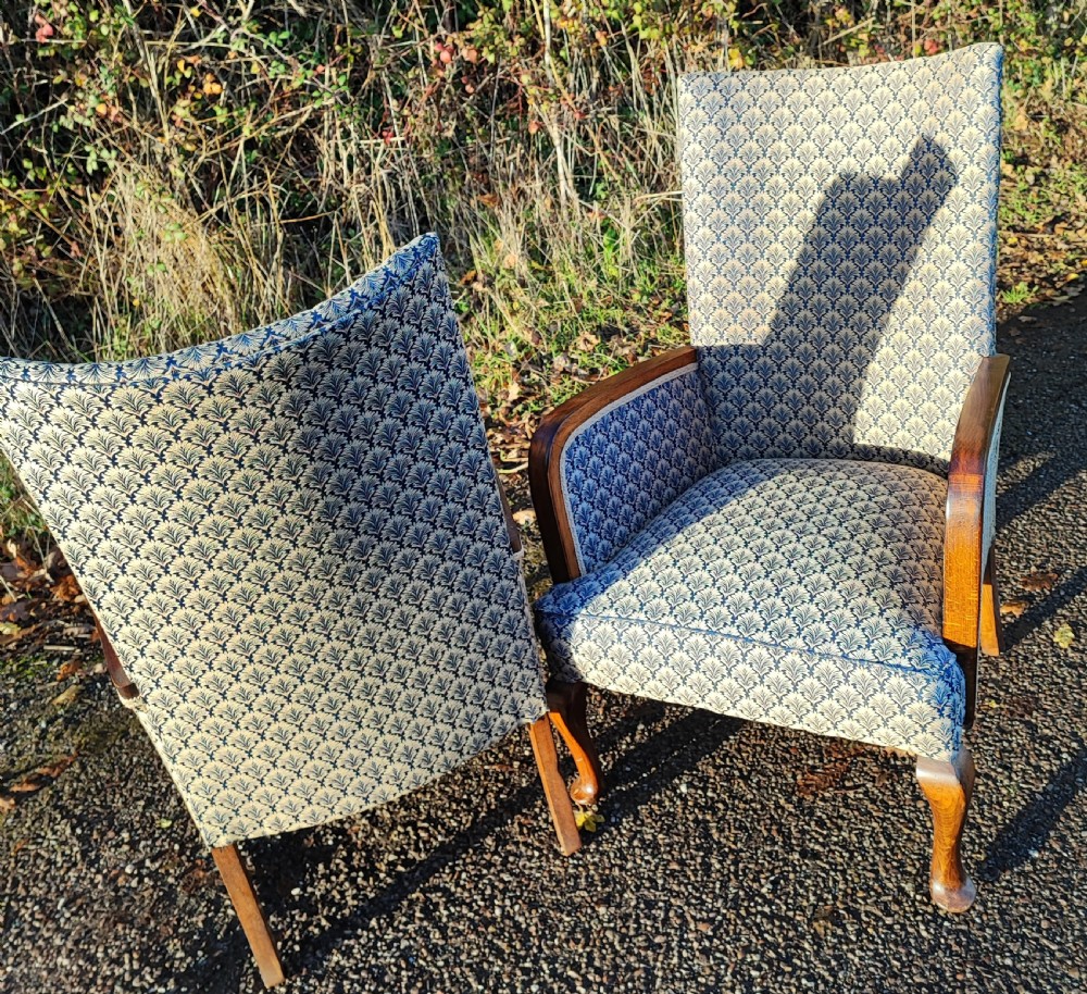 A pair of art deco upholstered armchairs. View VI