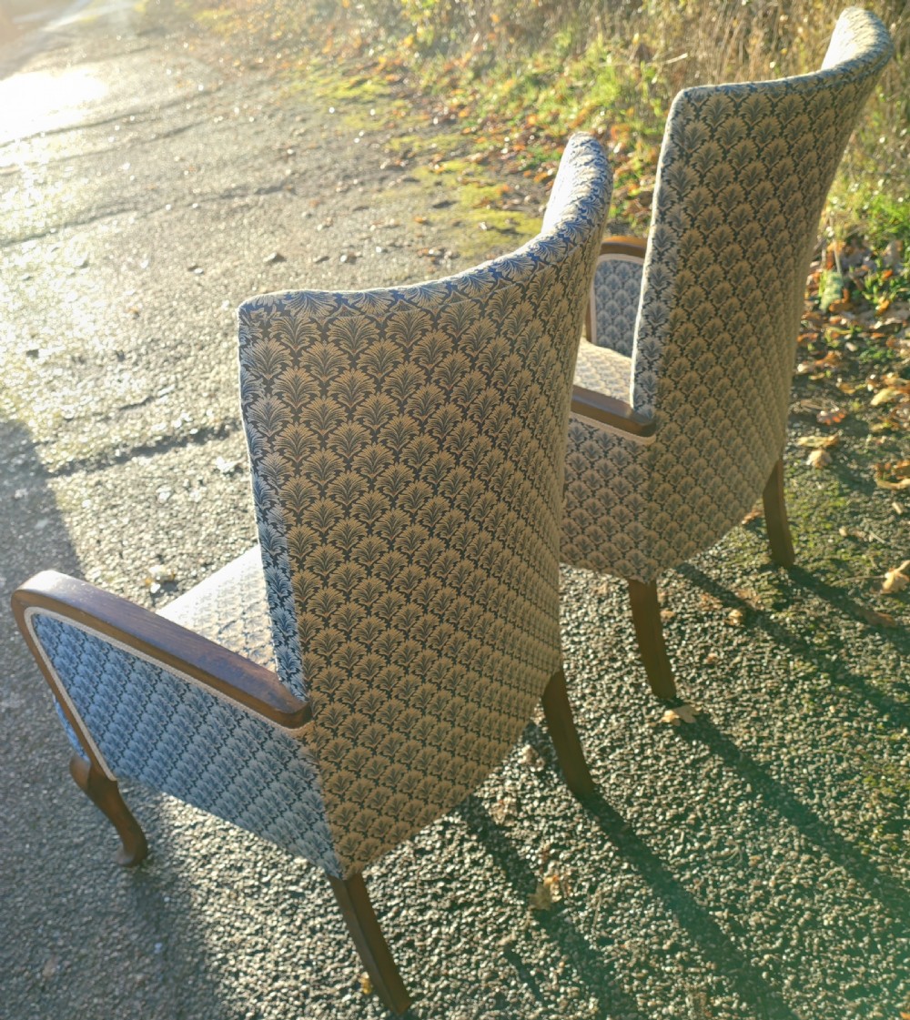 A pair of art deco upholstered armchairs. View VII