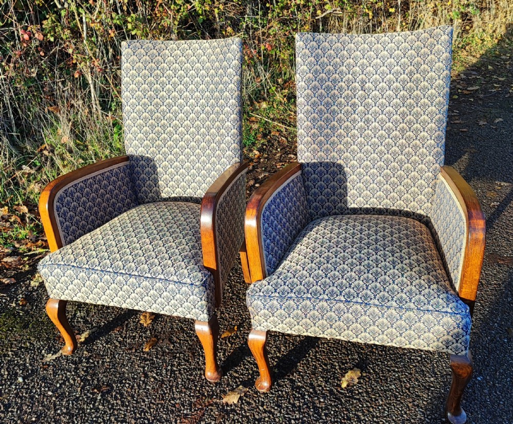 A pair of art deco upholstered armchairs. View IX