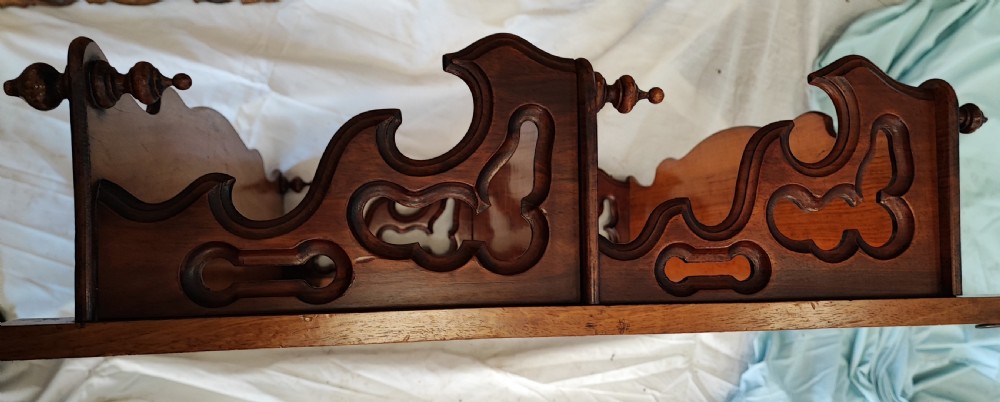 Victorian walnut hanging shelves. View VI