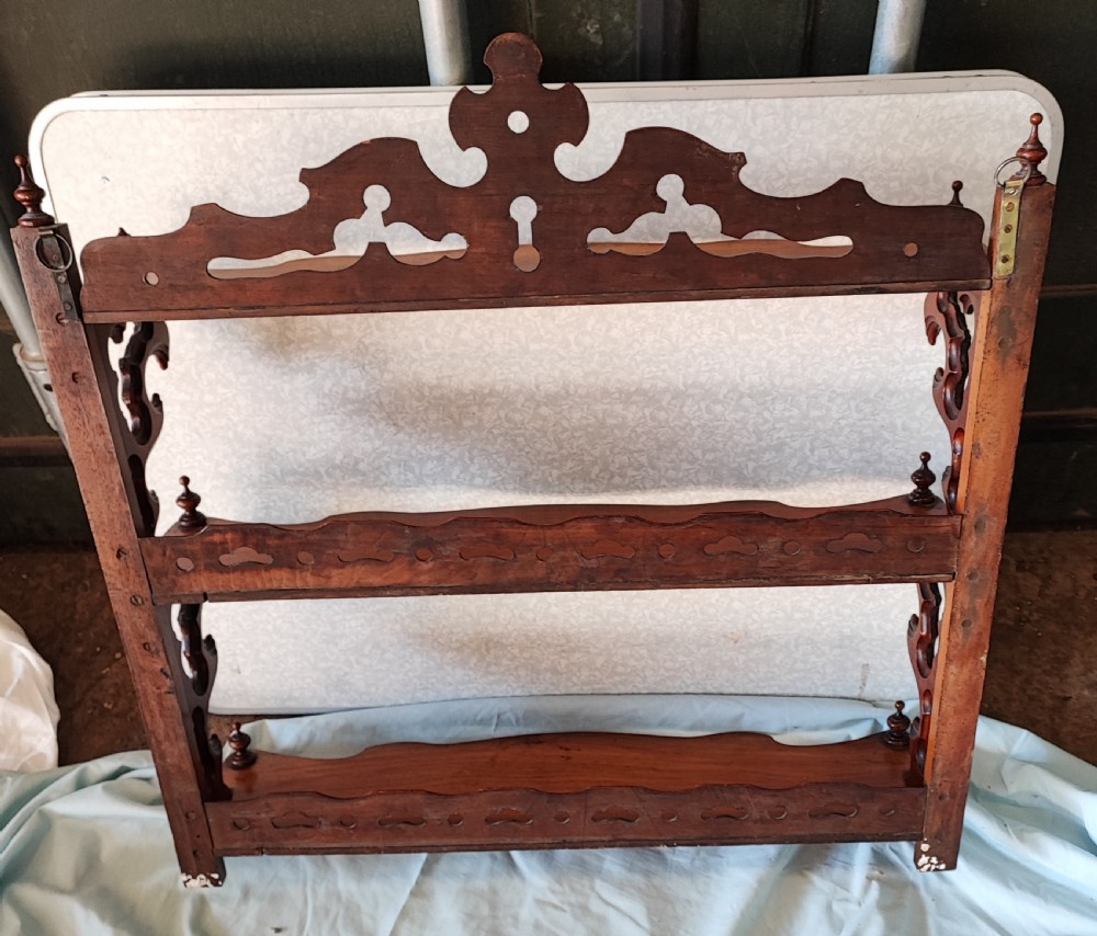 Victorian walnut hanging shelves. View XI