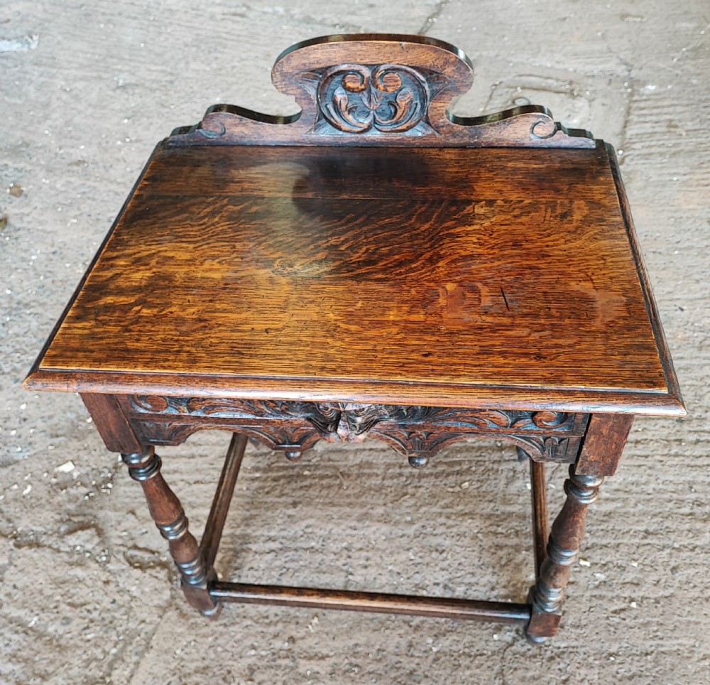 Victorian (Green Man ) carved oak side table. View III