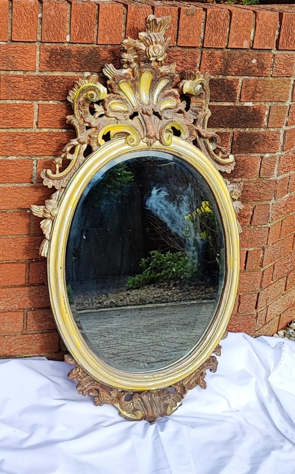 Antique carved and painted Italian mirror.
