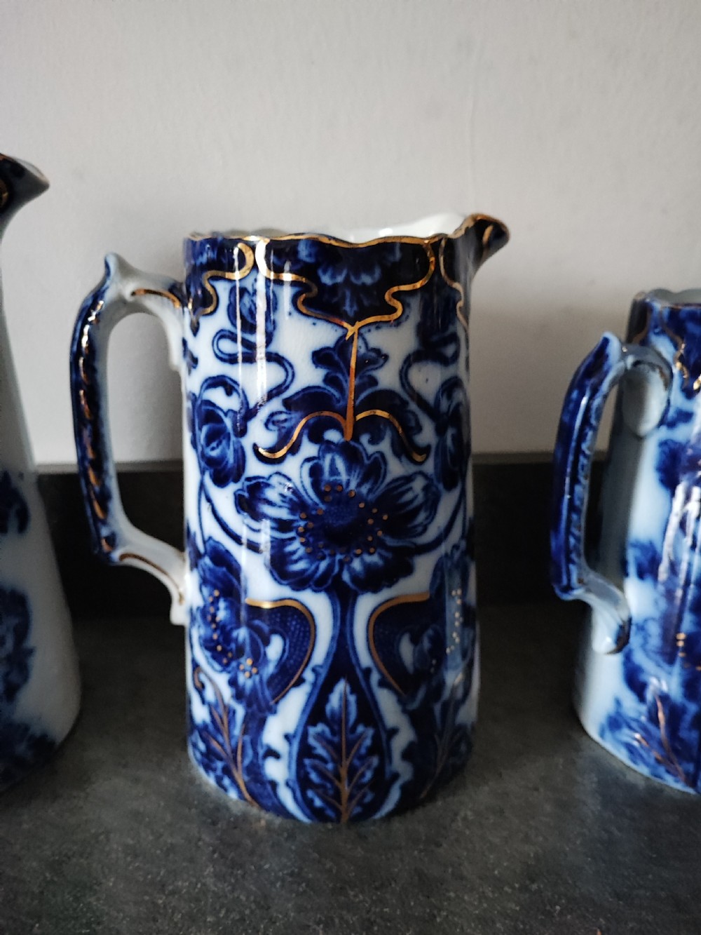 Good set of 3 Victorian Staffordshire flo Blue jugs. View II