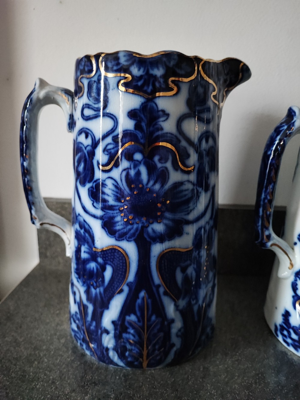 Good set of 3 Victorian Staffordshire flo Blue jugs. View VI