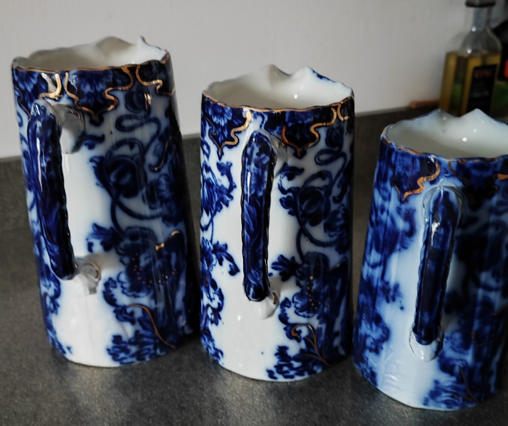 Good set of 3 Victorian Staffordshire flo Blue jugs. View X