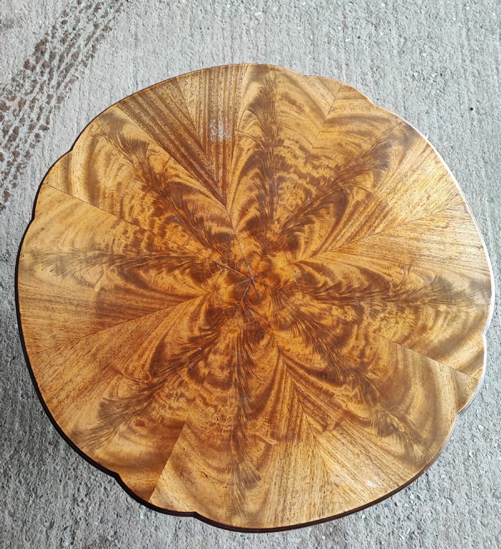 Antique circular figured mahogany coffee table. View II