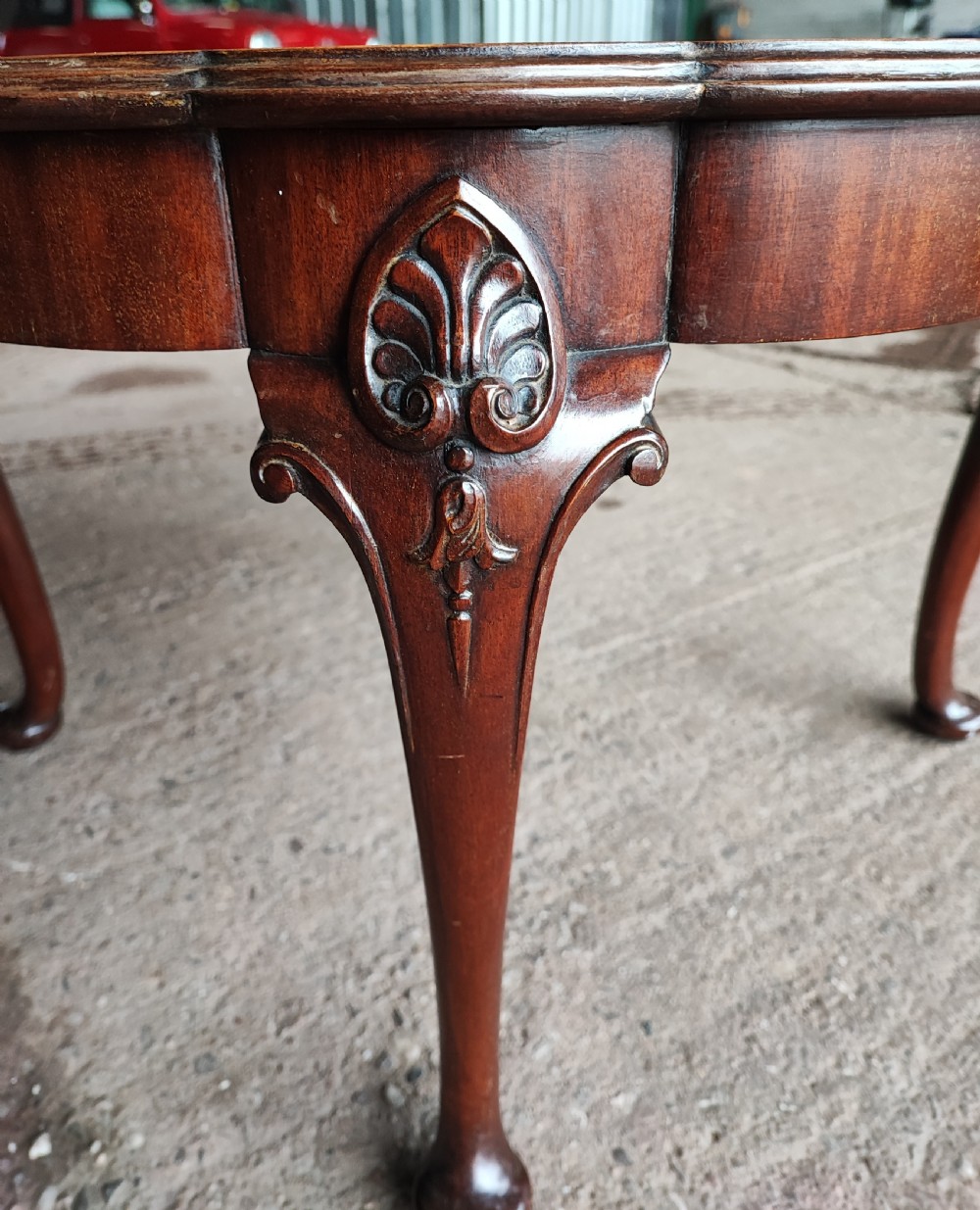 Antique circular figured mahogany coffee table. View III