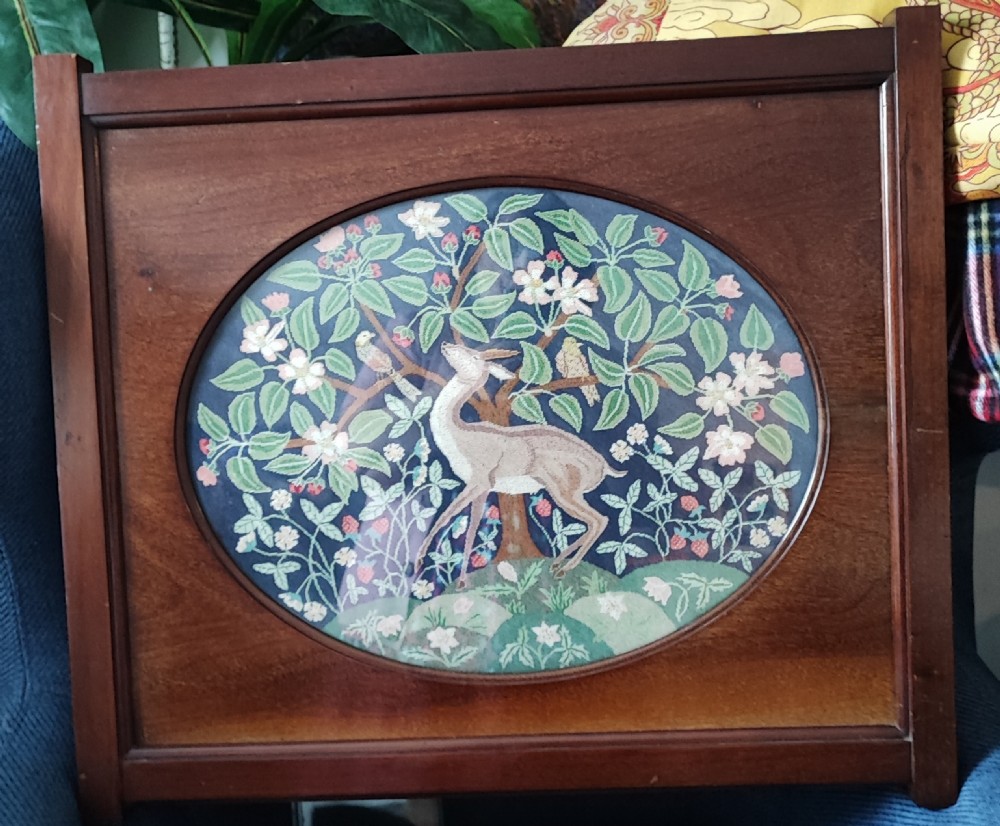 A fine Art's and crafts needlework framed panel ,signed M J Walker.