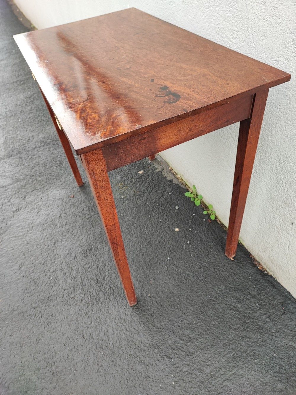 A George III mahogany 2 drawer side table. View IV
