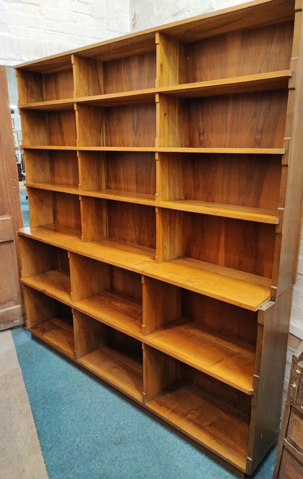 Antique walnut open bookcase.