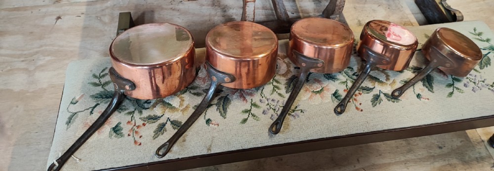 Antique set of 5 French copper pans.