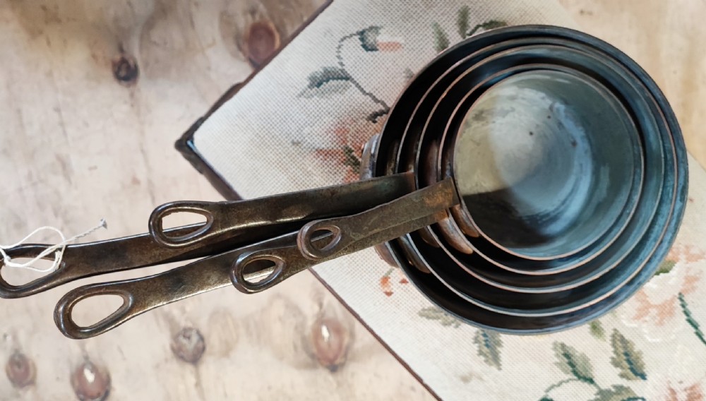 Antique set of 5 French copper pans. View V
