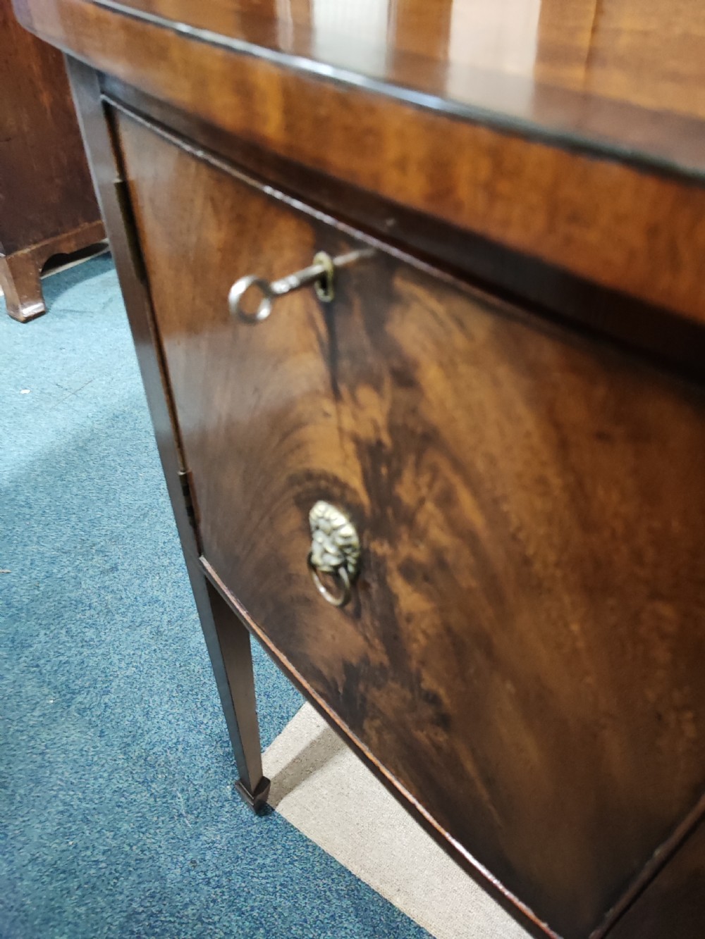 Antique bow front mahogany sideboard in the George III style. View III