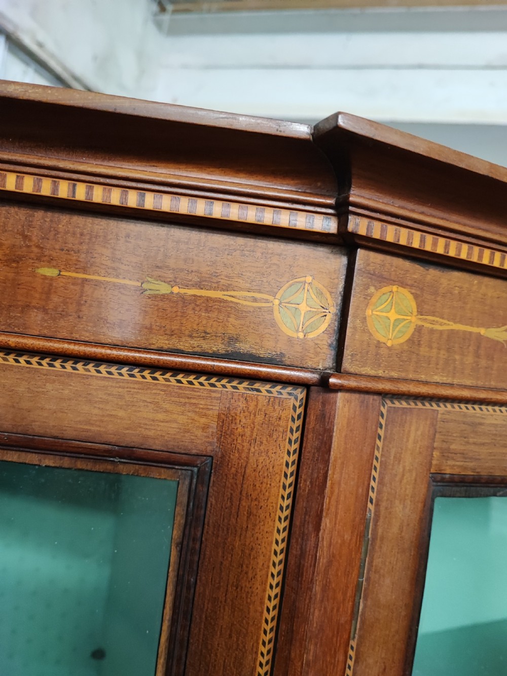 An Edwardian inlaid arts and crafts display cabinet. View XI