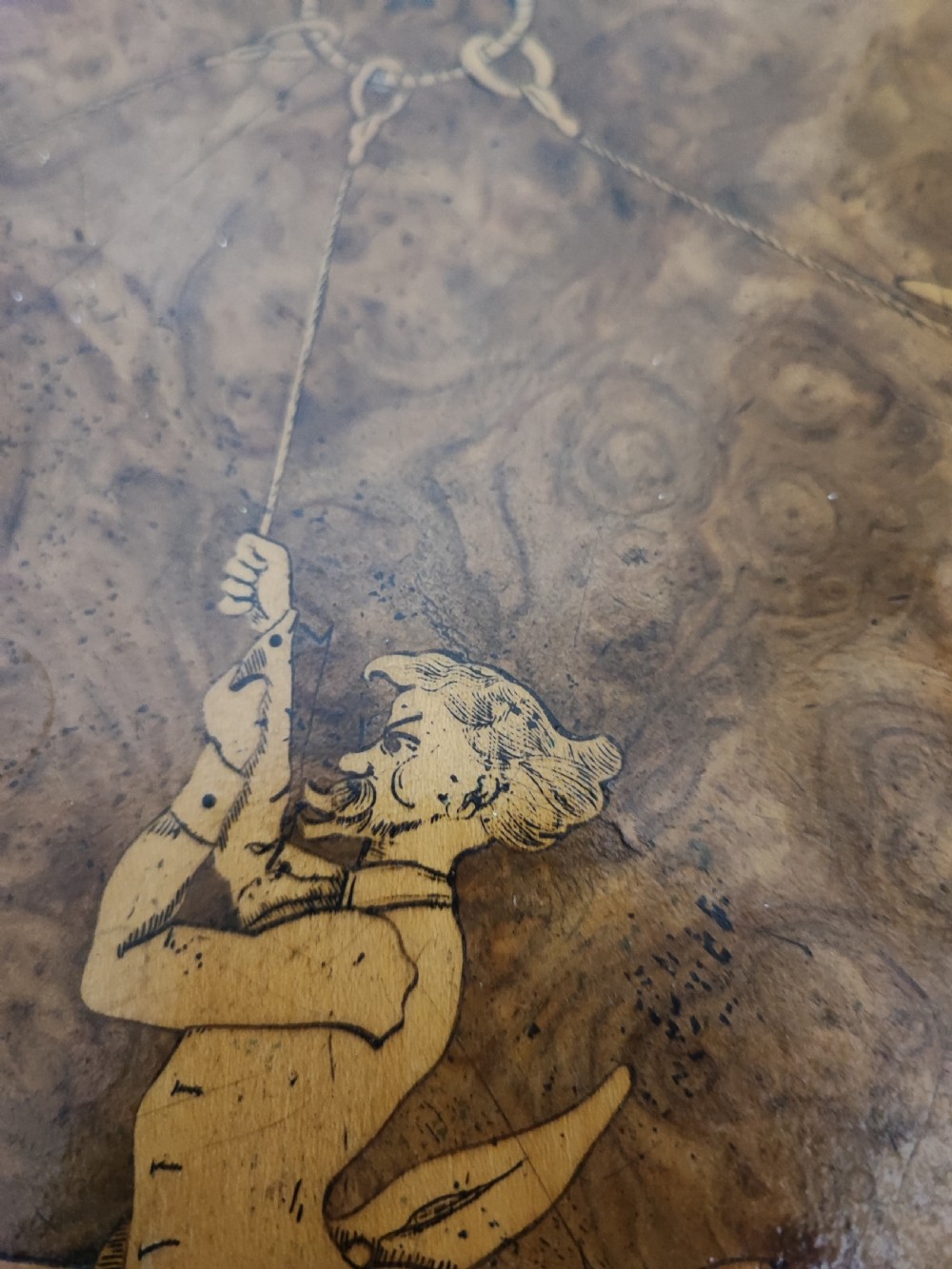 A fine and rare Victorian burr walnut tripod table. View XI