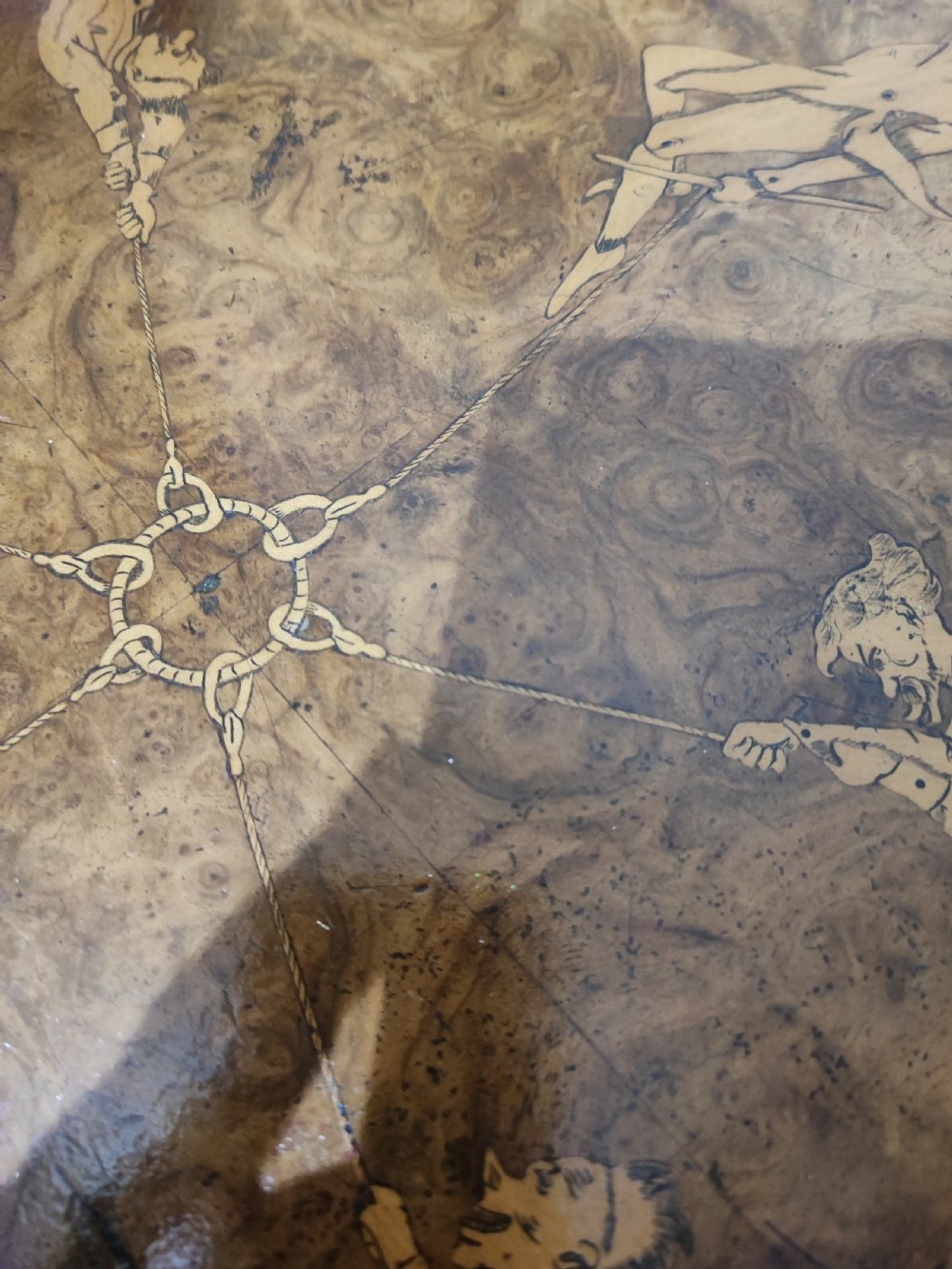 A fine and rare Victorian burr walnut tripod table. View XXI