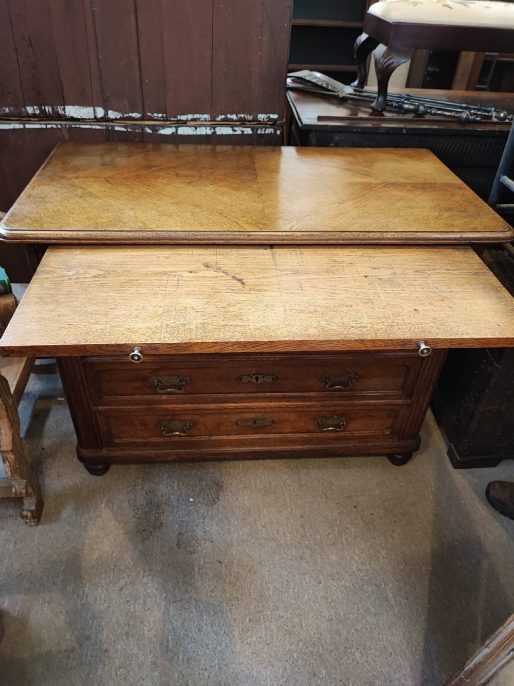 Antique French oak chest of drawers with writing slide. View IV