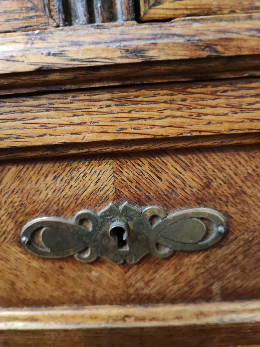 Antique French oak chest of drawers with writing slide. View VI