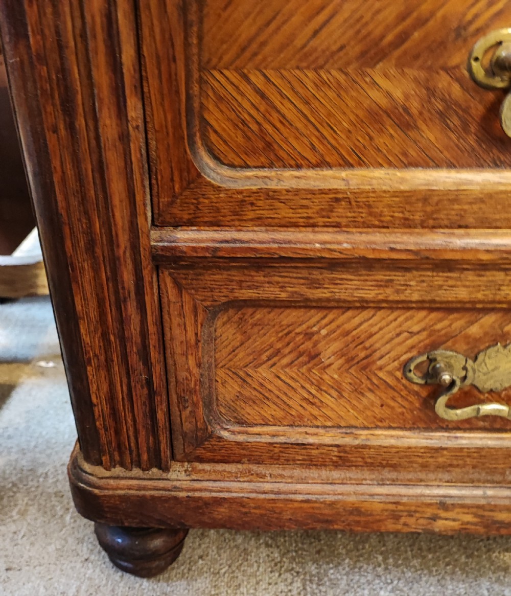 Antique French oak chest of drawers with writing slide. View XIV