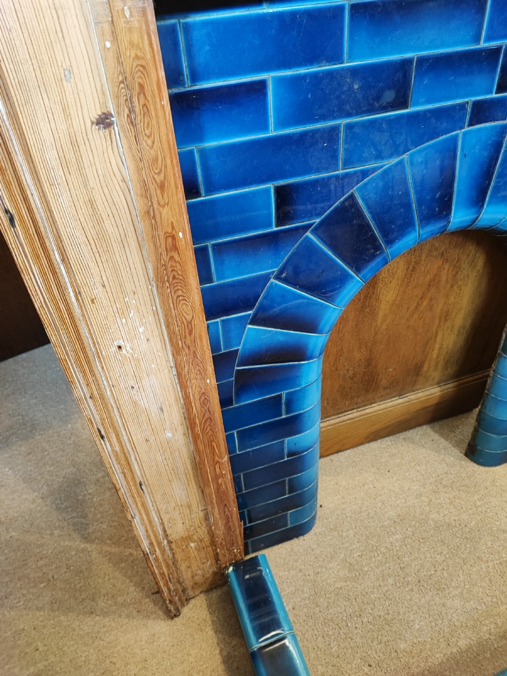 An antique pine fireplace and surround. View II
