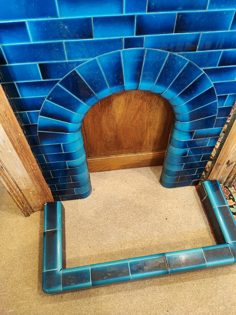 An antique pine fireplace and surround. View IV