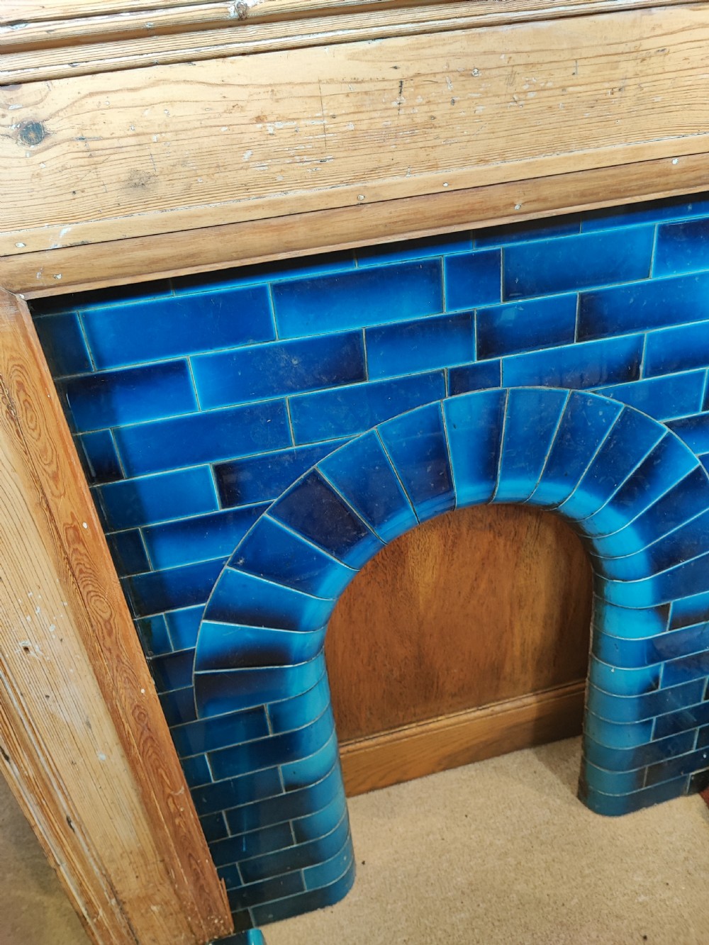 An antique pine fireplace and surround. View VIII
