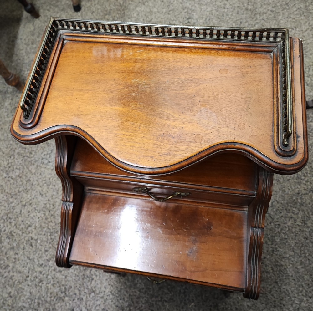 A Victorian walnut and brass tall coal box  View VI