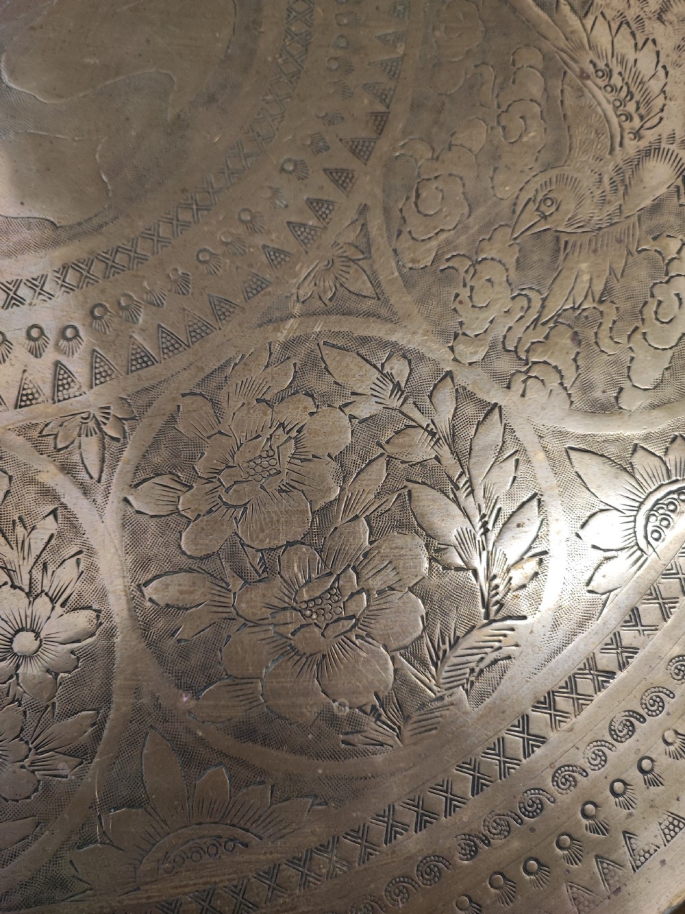 An antique brass topped middle Eastern coffee table. View VI