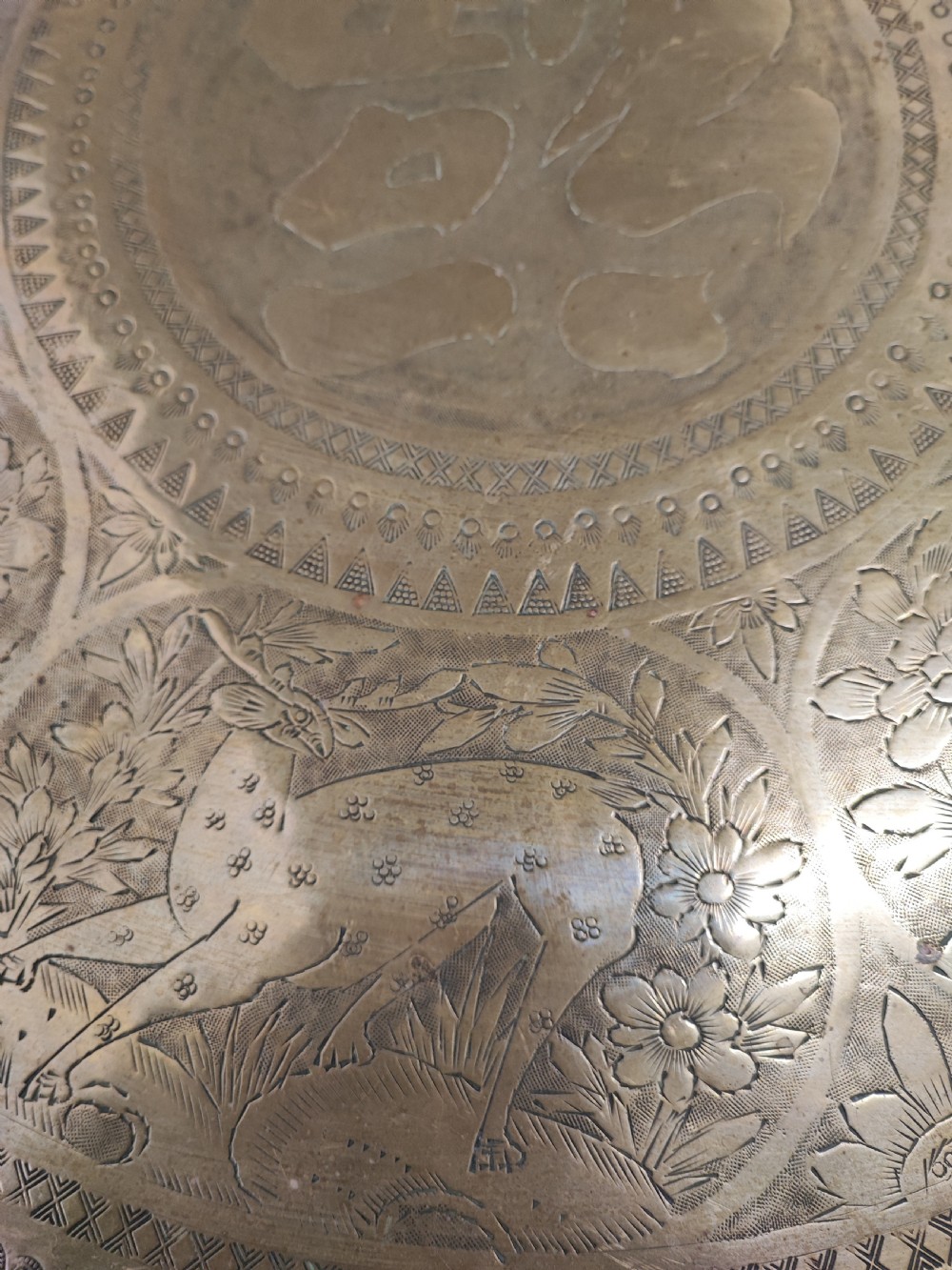 An antique brass topped middle Eastern coffee table. View VIII
