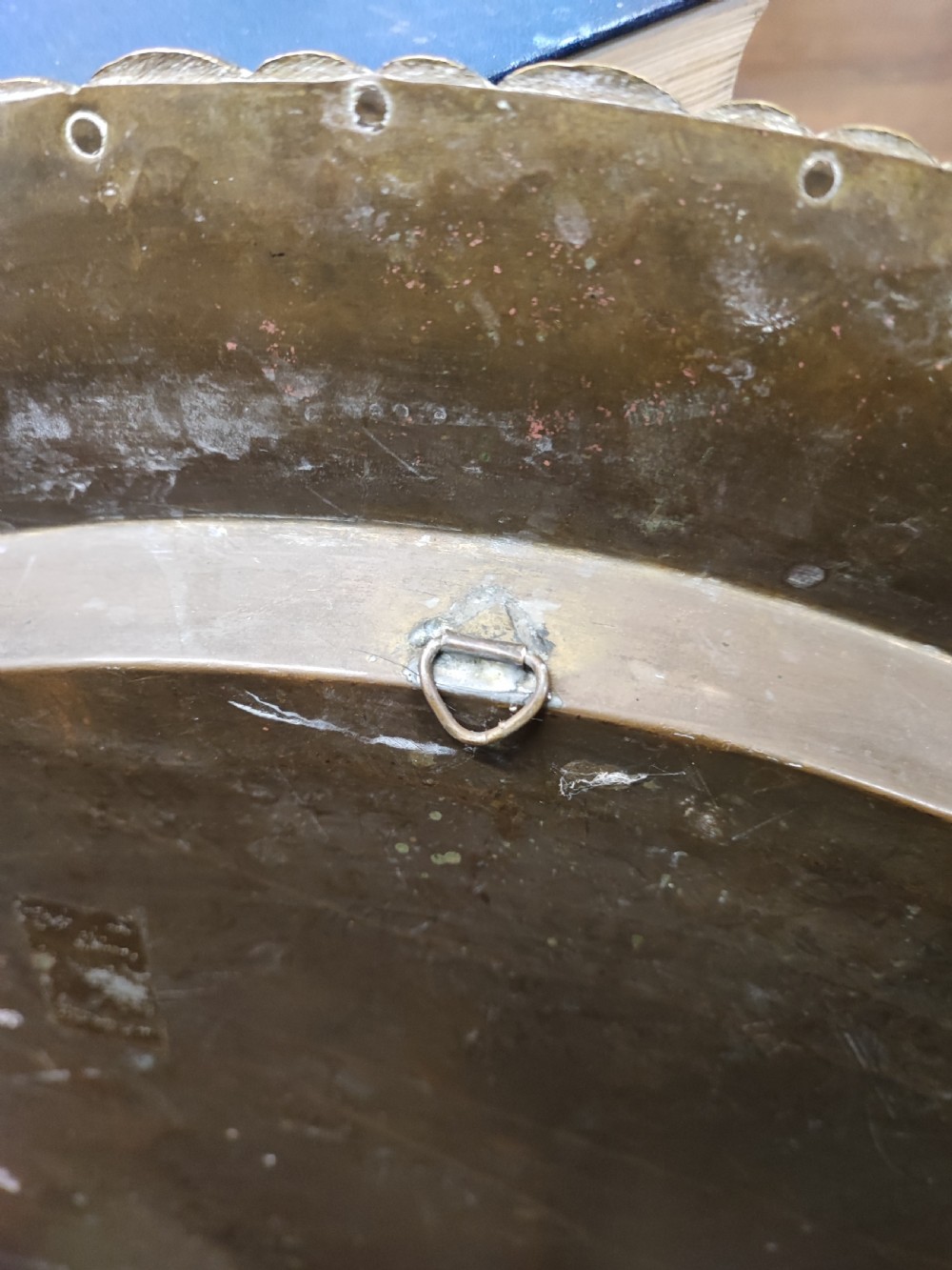 An antique brass topped middle Eastern coffee table. View X