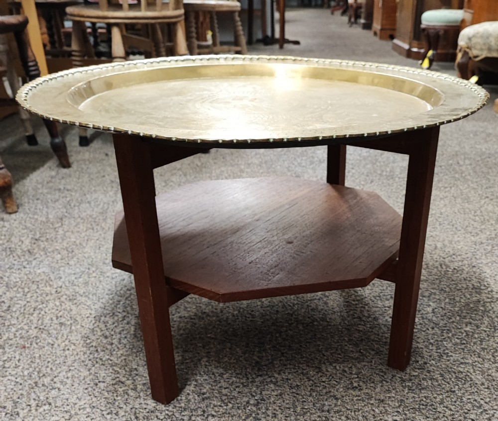 An antique brass topped middle Eastern coffee table. View XIII